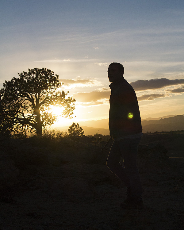 Silhouette of young man during sunset