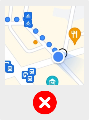 Screenshot of a navigation app, showing that the blue spotlight representing where the user is facing is pointing away from the direction of travel